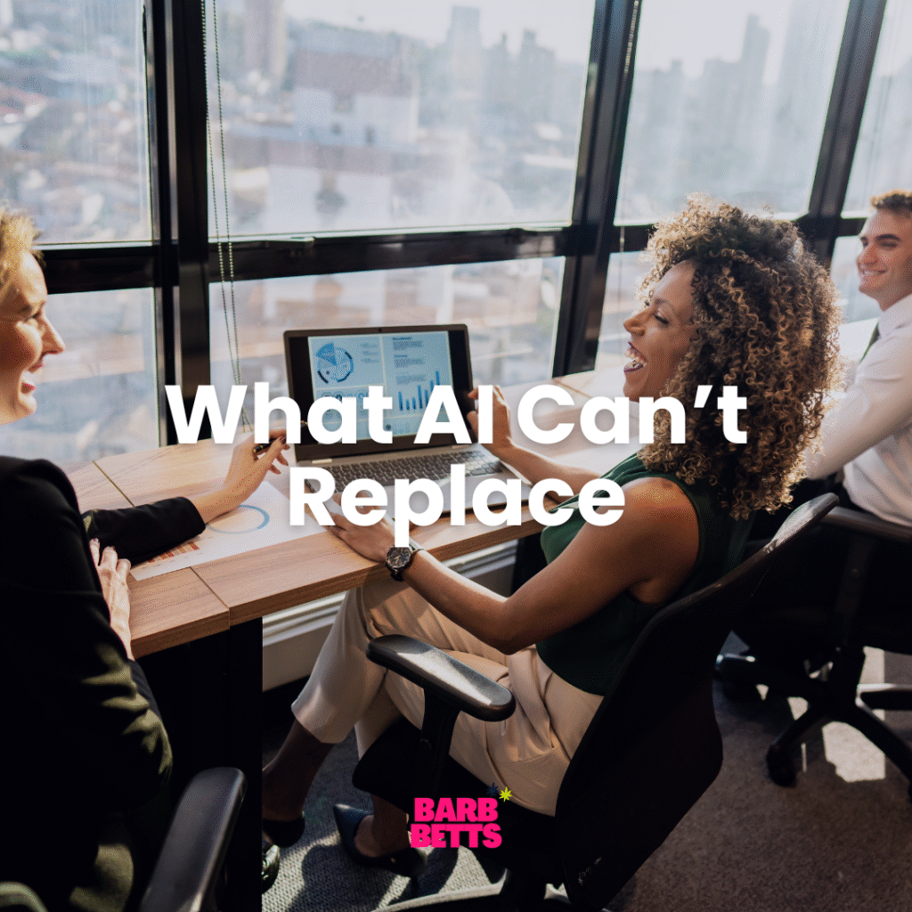Professionals having a genuine face-to-face conversation in an office, representing human connection in an AI-driven world