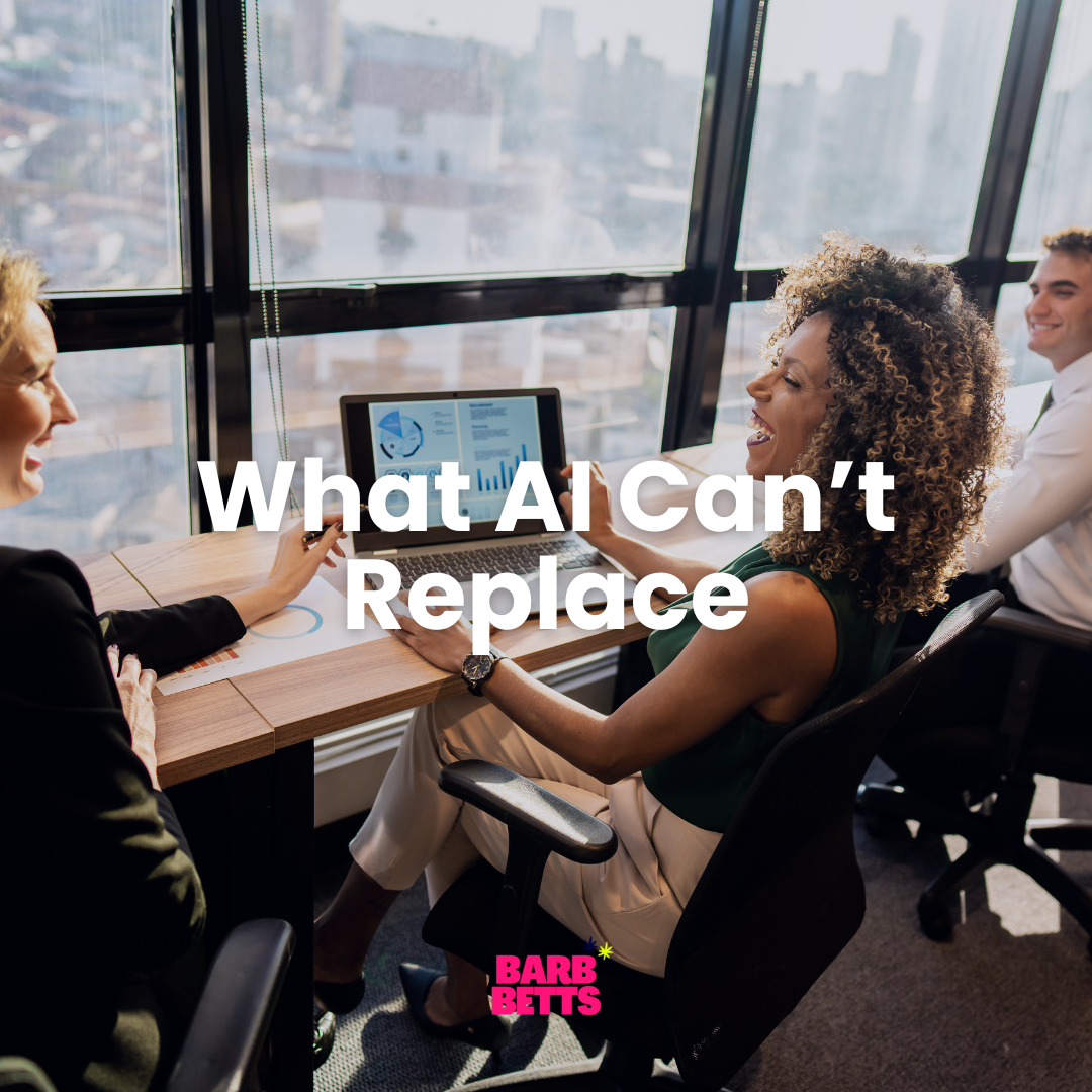 Professionals having a genuine face-to-face conversation in an office, representing human connection in an AI-driven world